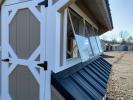 Windows on a chicken coop by Pine Creek Structures of Berlin